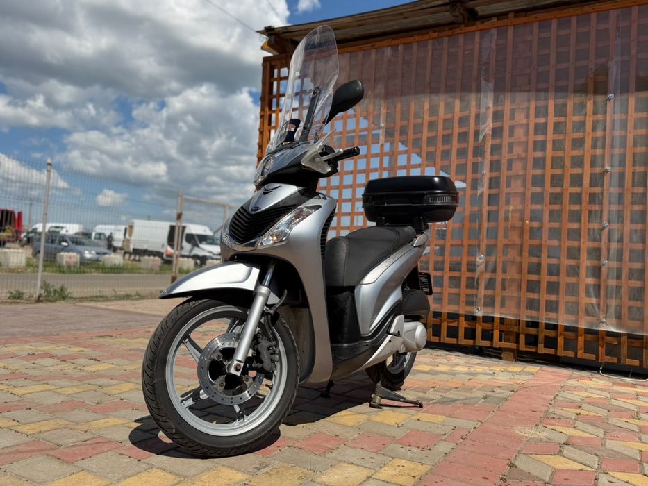 Honda sh 125i 2009 acte Germania se conduce cu categoria B