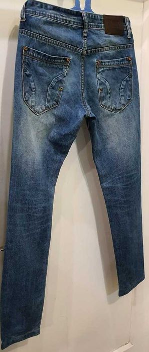 Джинсы на мальчика 14-15 лет.