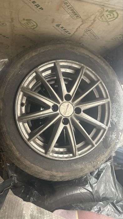 Титанка вместе с резиной 15/65/195