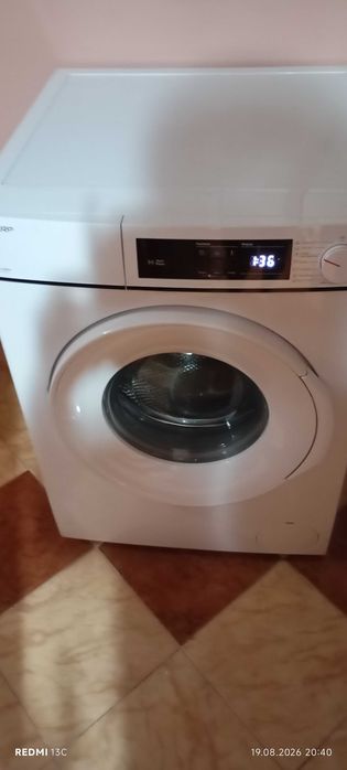 masina de spalat rufe SHARP este ca noua si muult sub pret
