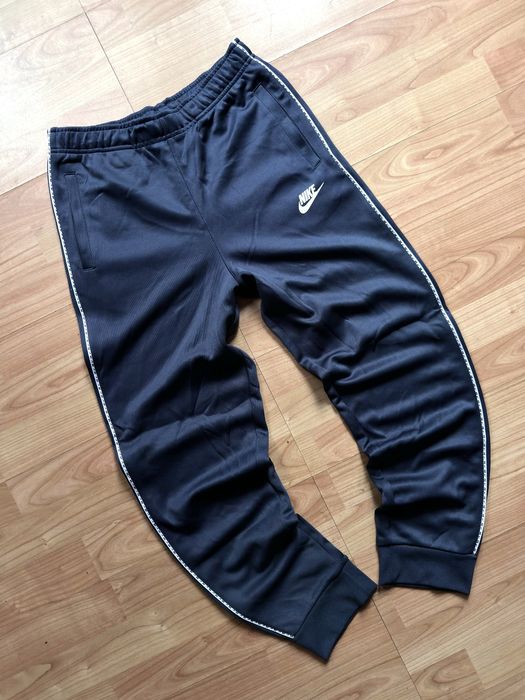 Pantaloni training pants joggers tapered leg Nike blue poliester