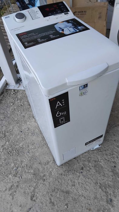 Пералня AEG с горно зареждане
