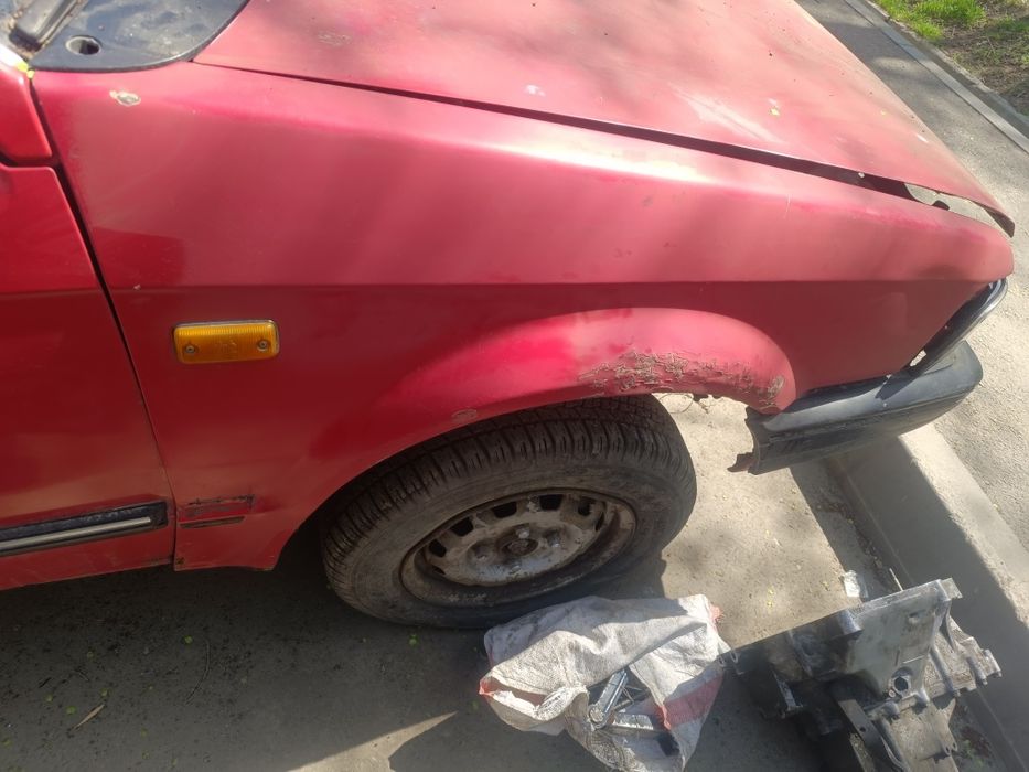 Правое крыло Mazda 323 BF