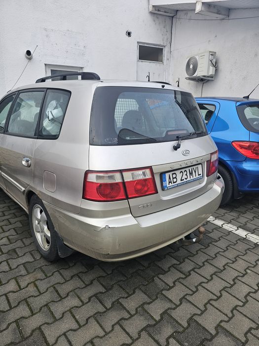 Kia Carens 2 2005 luna 10