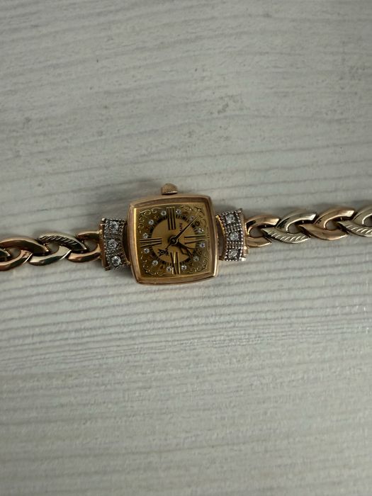 Золотые часы.