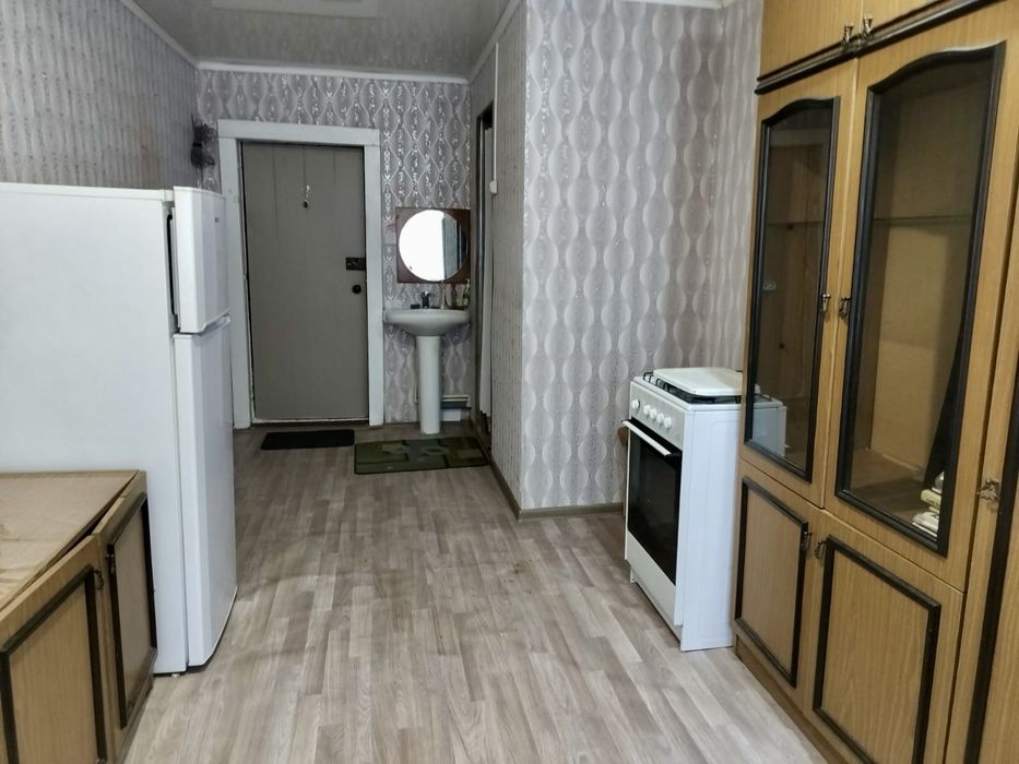 Комната в общежитии коридорного типа