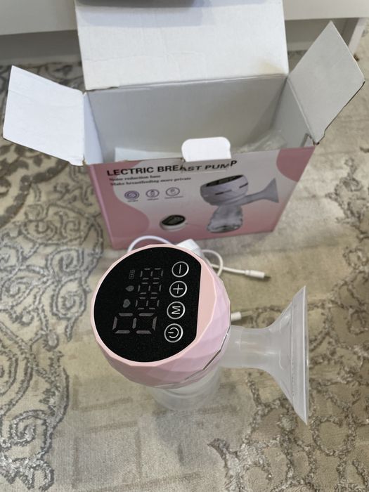 Электрический молокоотсос