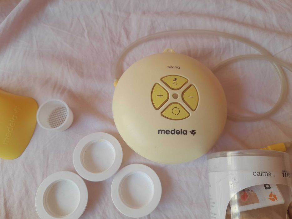 Двуфазна помпа за кърма Medela и подарък стерилизатор за микровълнова