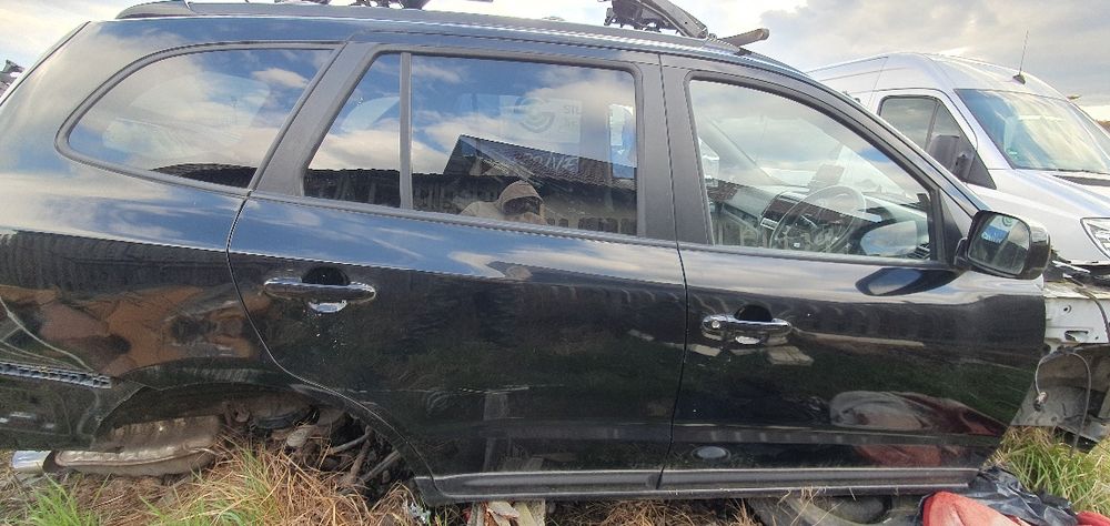 Ușii stânga ~ dreapta față si spate Hyundai Santa fe an 2008