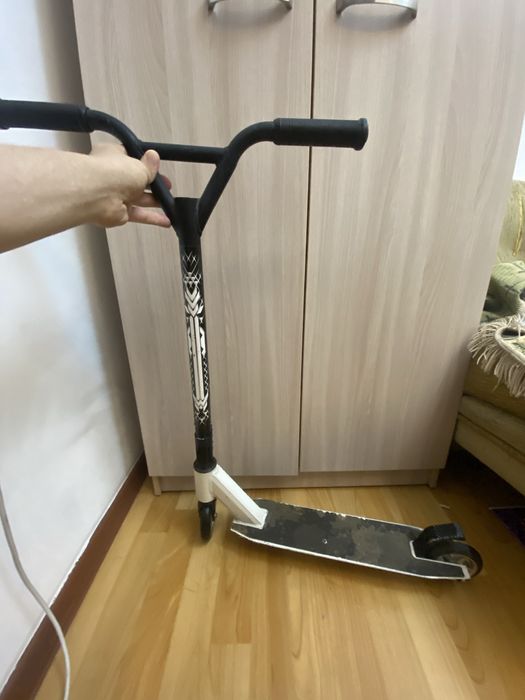 Трюковой самокат.