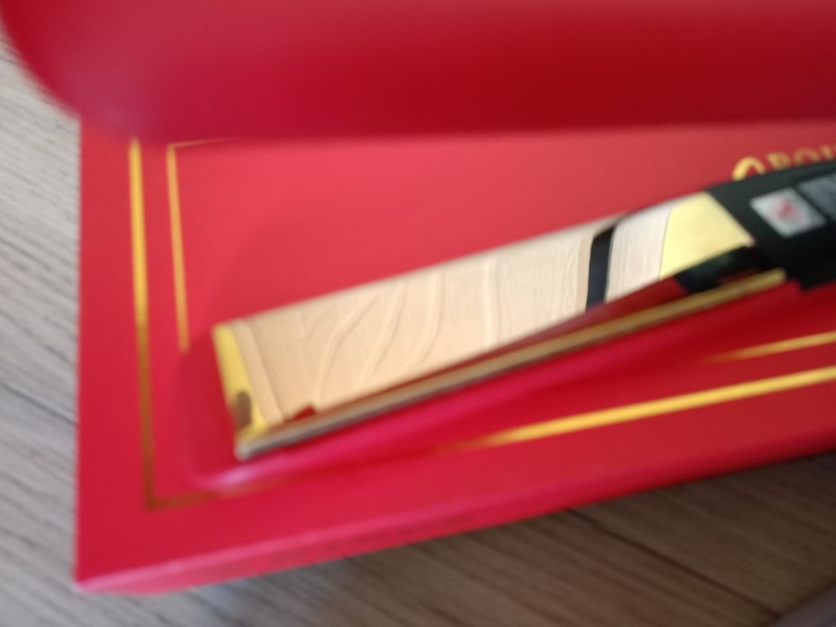 Преса за коса изправяне