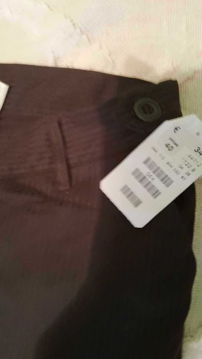 Дамските летни  панталони размер 40 . Кафяв цвят .Нови са.H&M