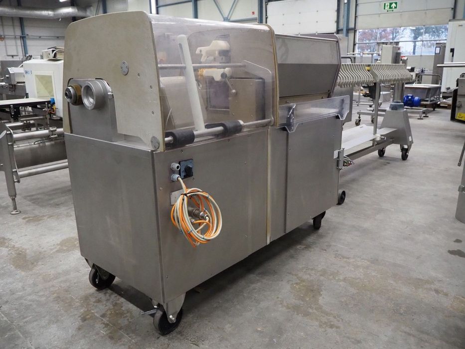 Handtmann Машина за връзване/пресукване  и окачване