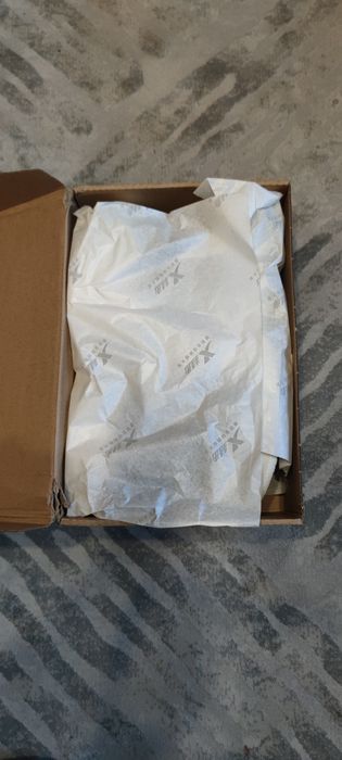 Кроссовки фирмы Xtep