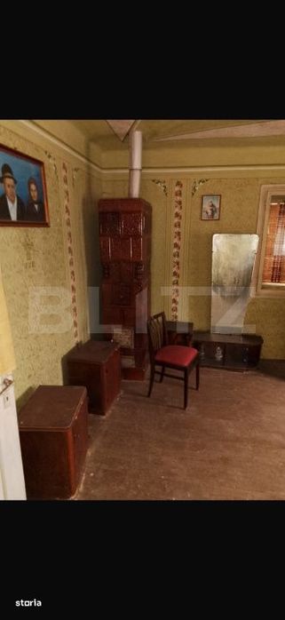 Casa cu 3 camere si un teren de 3000 mp