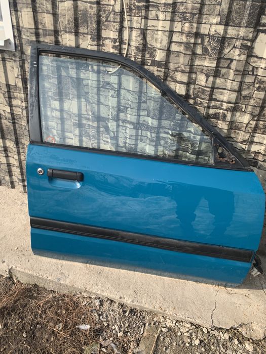 Двери на мазду 323 седан