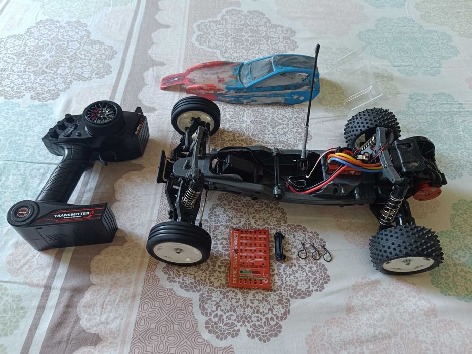 Radiomodel asamblat Tamiya #58587 DT-03 „Neo fighter buggy” (fără electronice)