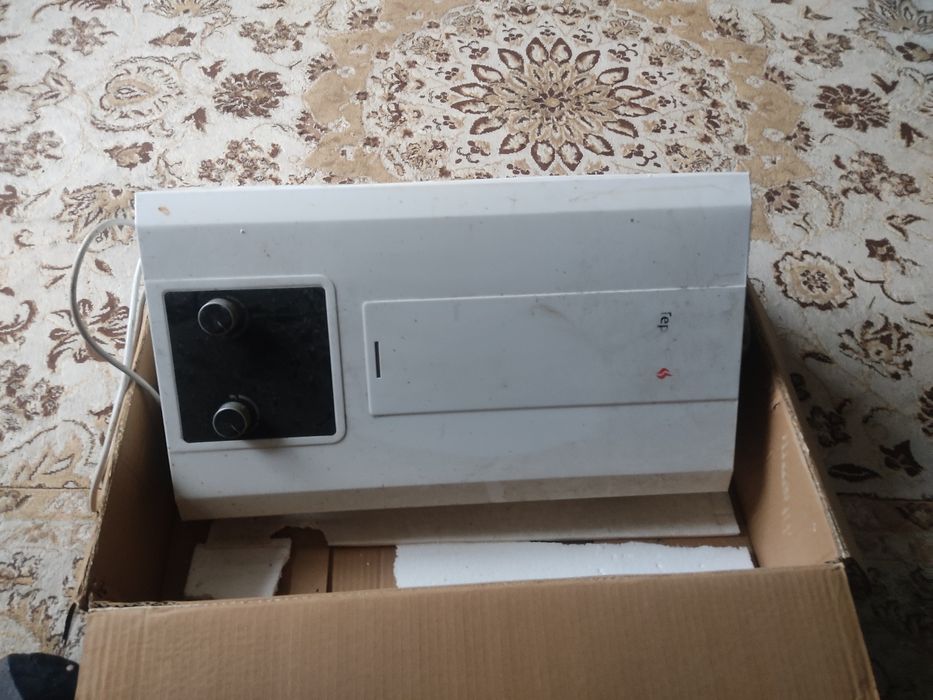 Газовый проточный водонагреватель теплоросс