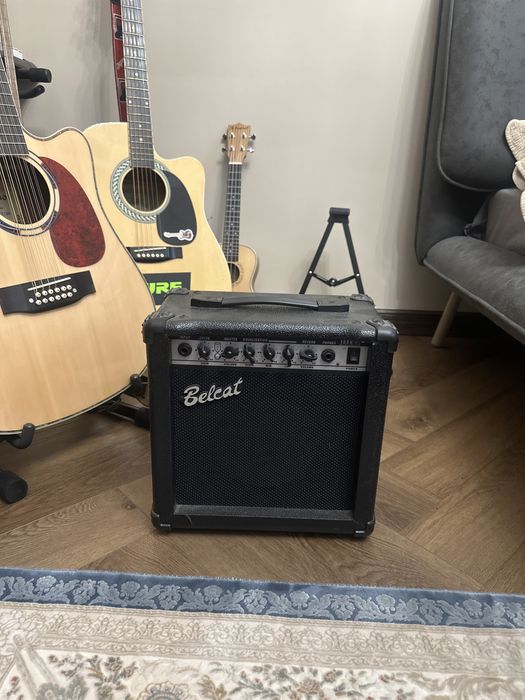 Гитара с комбоуселителем