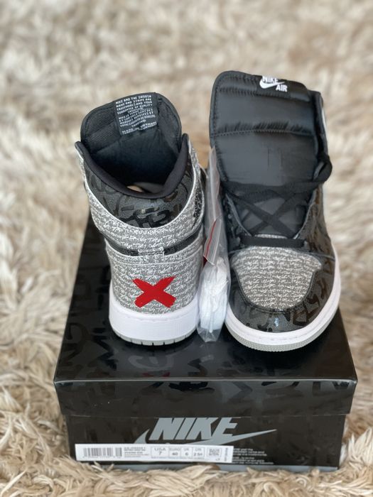 Air Jordan 1 High Rebellionare Black White Particle Grey Cement OG Pat