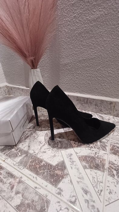 Обувки на висок ток