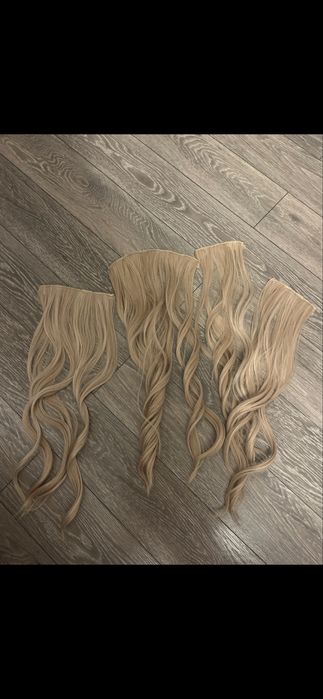 O bijuterie 4 bucati extensi de par blond clip on 50 cm pret 250 lei