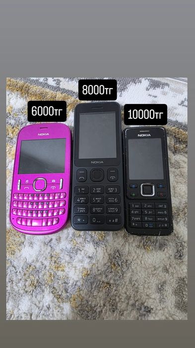 Кнопочный телефон дар ар турлы багада.