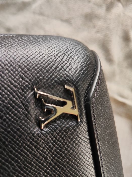 Louis Vuitton sling bag taiga