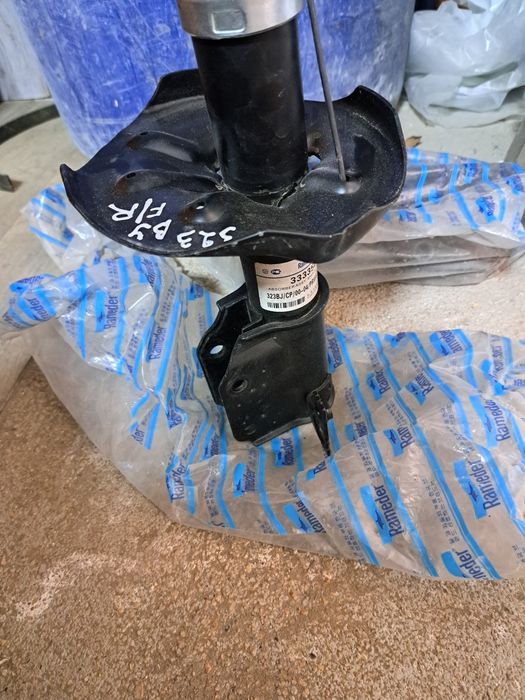 Амортизатор на мазду