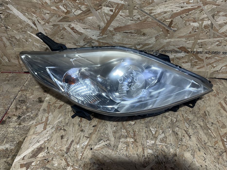 Far/Faruri stânga-dreapta Mazda 5 2010