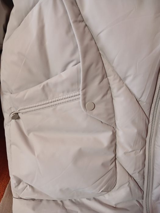 Продам пуховик новый