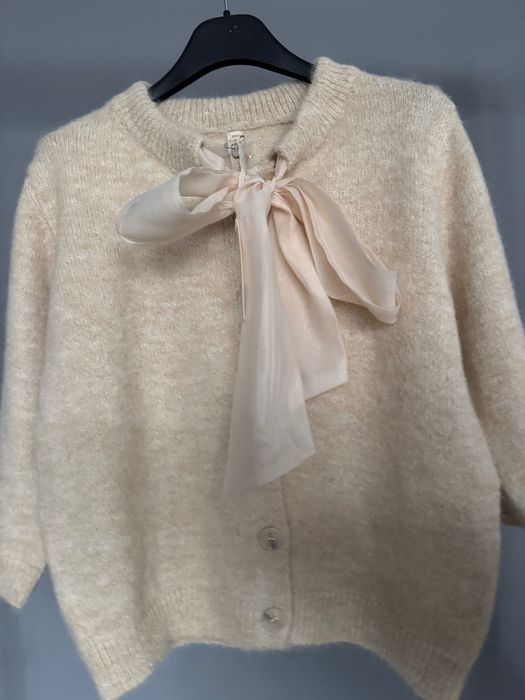 Жилетка с вълна и панделка