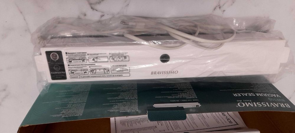 Машинка за вакумиране.