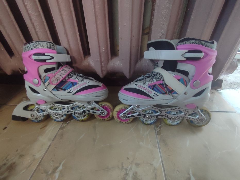 Продам роликовые коньки