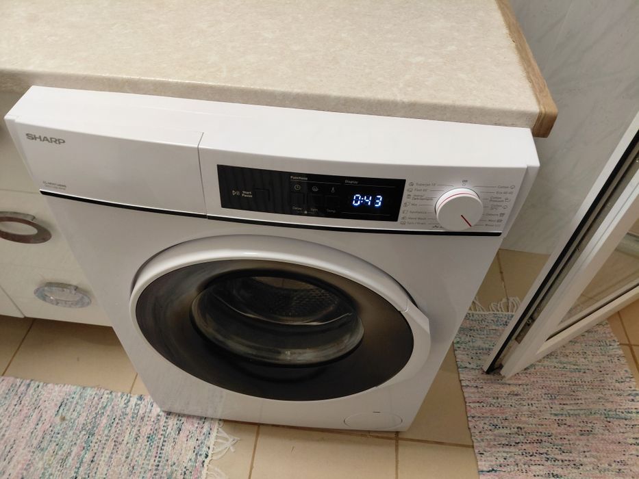 Masina de spalat rufe Sharp 7 kg 1400 rp are 1an si ceva