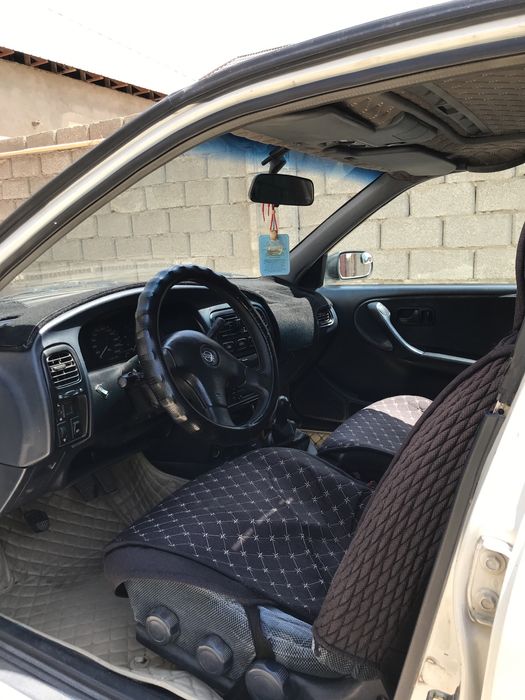 Nissan Primera белый