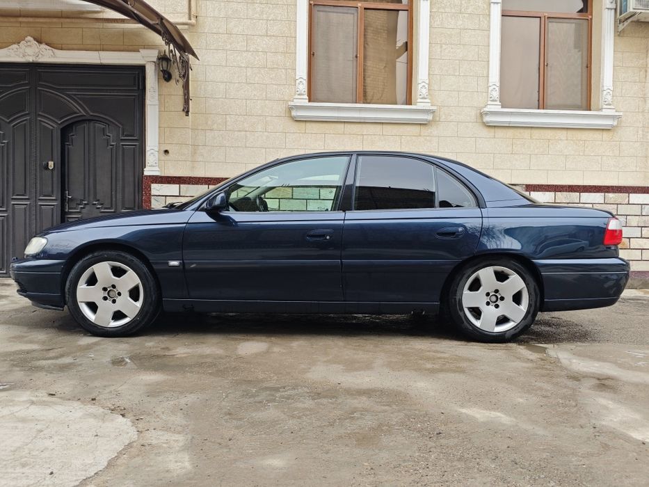 Opel Omega B 3.2 V6 2002 метан/бензин