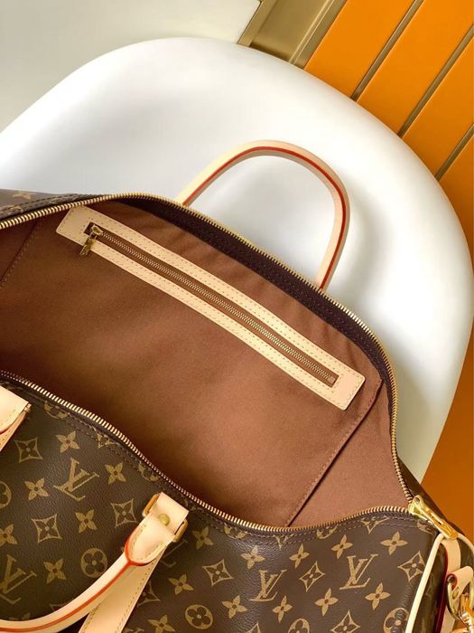 Сумка Keepall 45 cm с плечевым ремнем Louis Vuitton