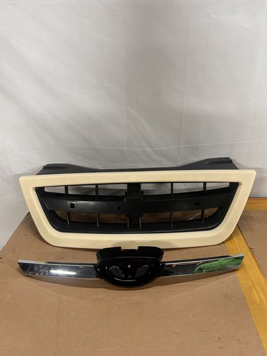 DAEWOО NEXIA Решетка+значок