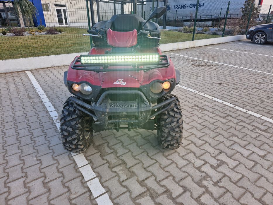 Vând sau schimb ATV Kawasaki