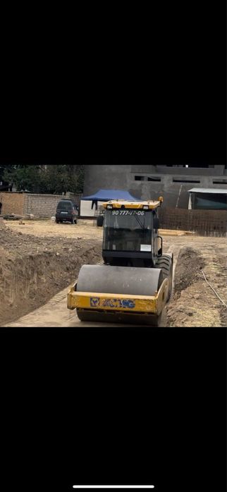 Экскаватор хизмати