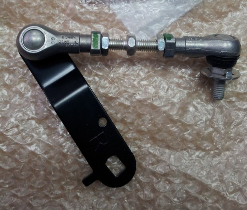 Тяга корректора фар