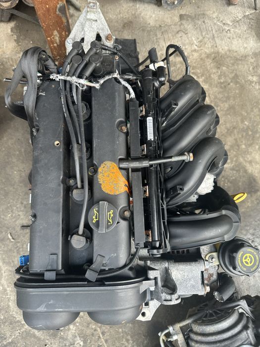 Двигатель форд фокс  1.6