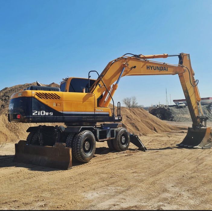 Экскаватор Услуги apенда кoлёcного экскаватoрa