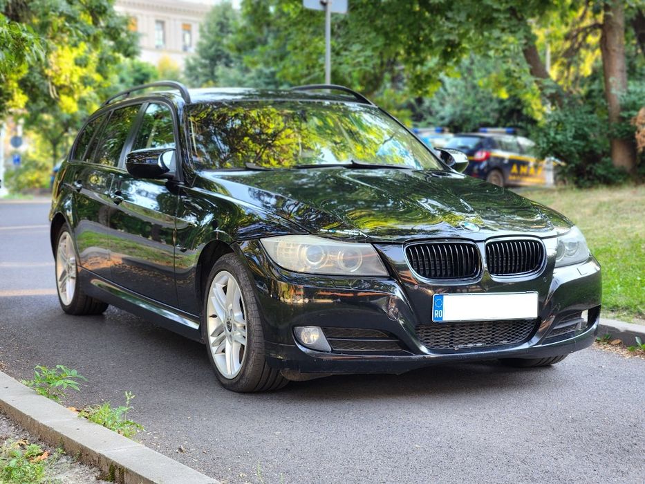 BMW 318d Touring • 2.0 Diesel 143 CP • Xenon Adaptive • Navi Mare • Încălzire Scaune