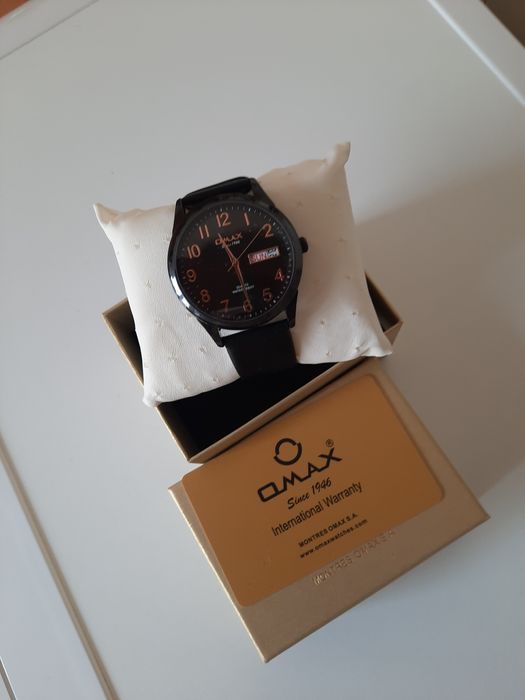 Кварцевые часы оmax