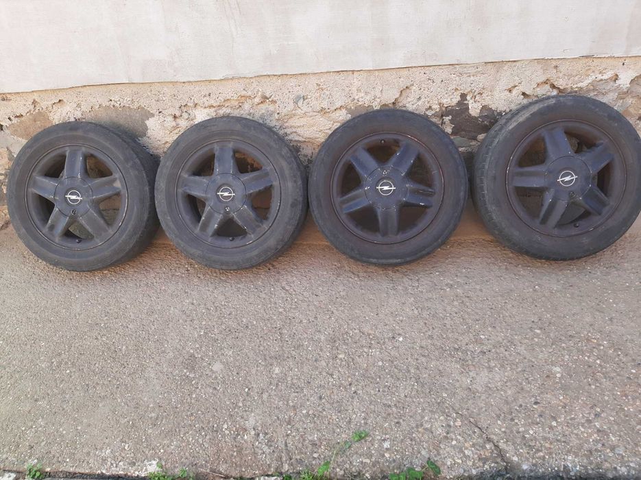 Vând set 4 roți aliaj opel astra g r15 cu cauciuc