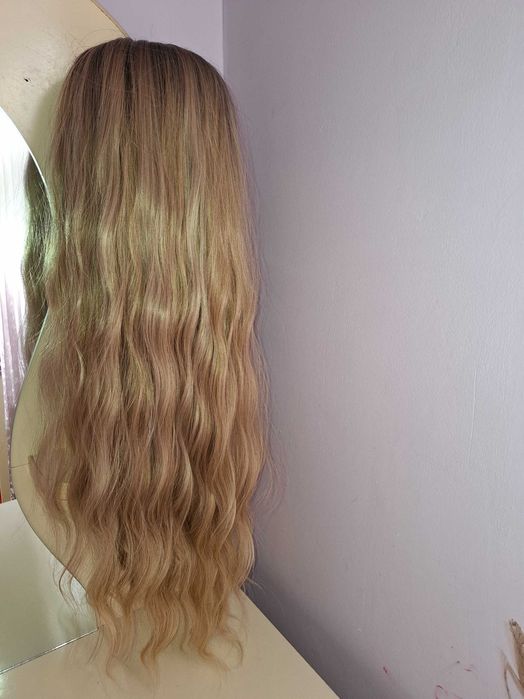 Parik, xuddi tabiiy sochga o'xshaydi