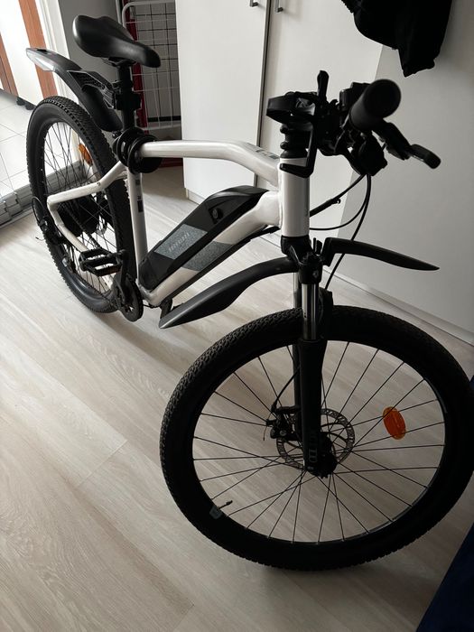 Rockrider E‑ST100 Bicicletă electrică,1500 km, stare foarte bună
