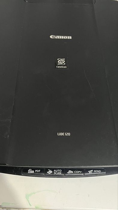 Обычный сканер Canon формата А4.